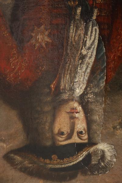 Cultura encuentra imágenes e inscripciones ocultas durante la restauración del famosos retrato de Felipe V 'boca abajo' de Xàtiva